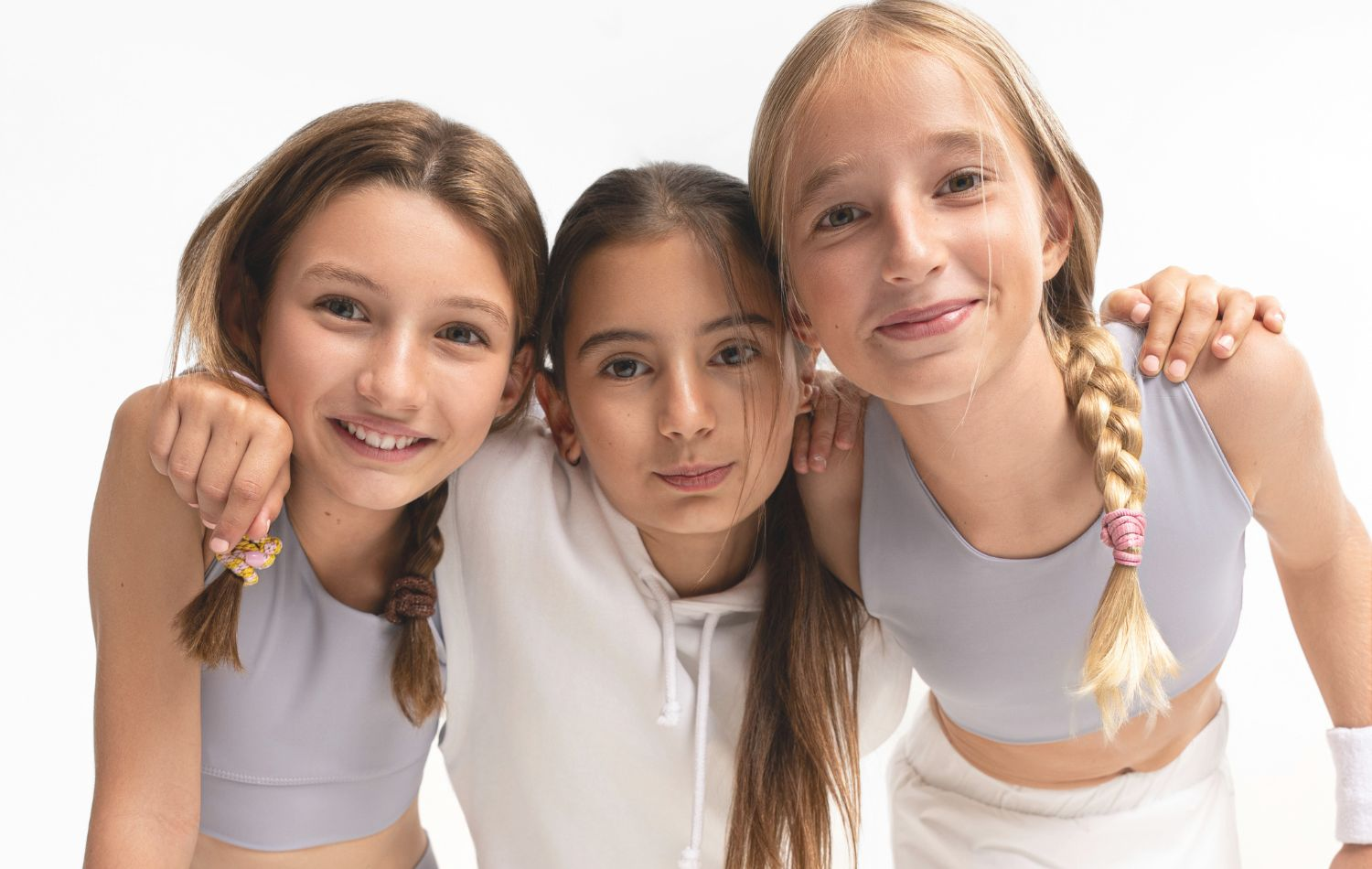 Active girls wearing Bloomy Kids pastel athleisure, perfect for movement and everyday style.